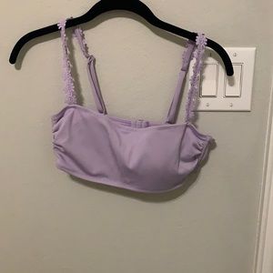 purple swimsuit top with floral straps